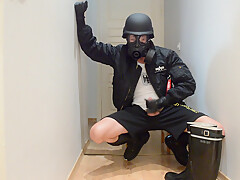 Gas masked guy cums on his rubber boots