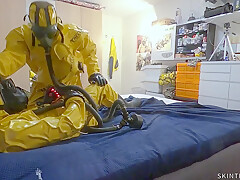 Vacuuming in tellchen hazmat suits